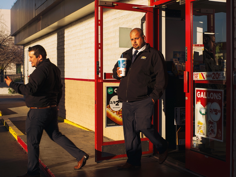 At_the_gas_station_at_sunset_2_men_s.jpg