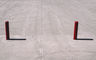Red Angles Bollards on Concrete 02