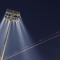 Lighttrail of floodlight and plane 02-11m
