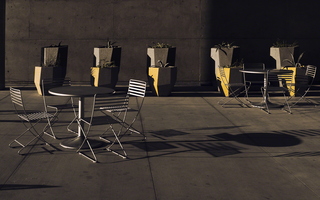 First Spring Sunday Empty Chairs Concrete Planters d