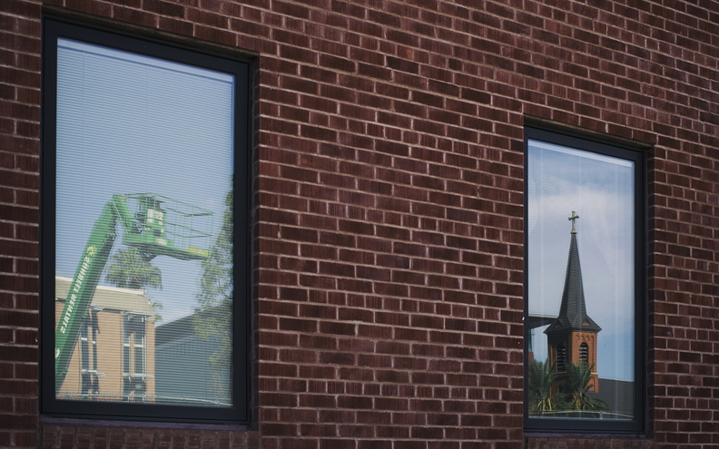 Window_Reflection_Church_Lift_Brickwall.jpg