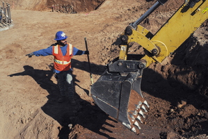 Tempe Construction January Excavator Worker Shovel