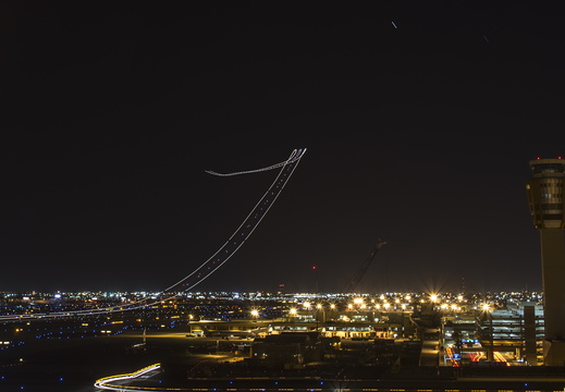 Phoenix Arizona Sky harbor night airplane take off light trails